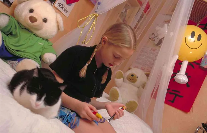 Patient using NovoPen® 3 for children.